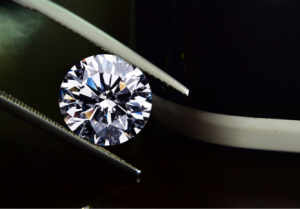 ALROSA Halts Sales as Diamond Glut Persists